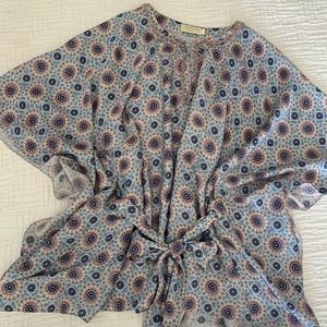 SOLD- Chic design, lovely blue blouse.